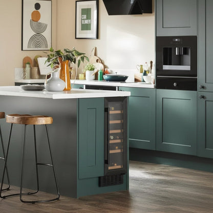 Modern kitchen with a wine cooler integrated into a green cabinet.