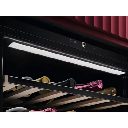Wine cooler with digital display and wine bottles inside